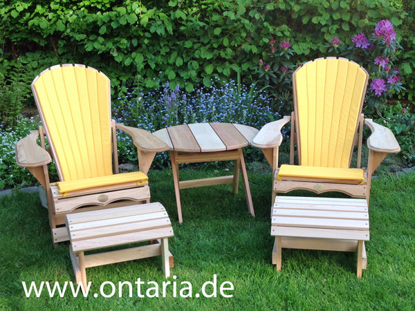 Adirondack reclining chairs with upholstered cushions and table